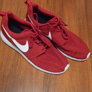 Nike Red Athletic Shoes with White Logo